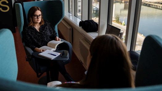 Two people in conversation.