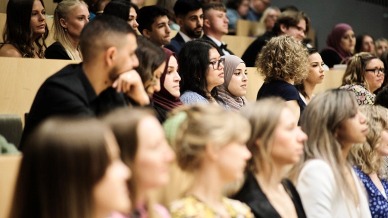 Students in lecture hall.